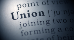 Massachusetts rideshare drivers are pushing for unionization as wages decline, highlighting concerns over pay transparency, company profits, and recent state labor changes.